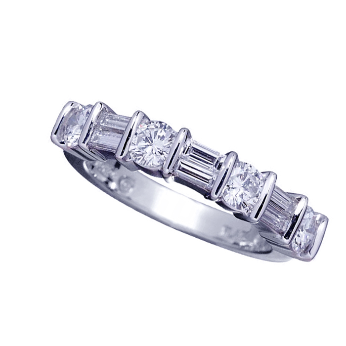 Platinum emerald cut and diamond ring