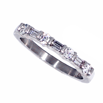 Platinum emerald cut and round diamond ring