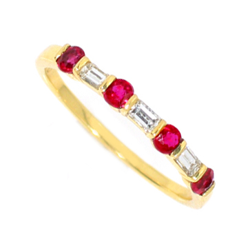 18 Karat rubies and emerald cut diamond ring