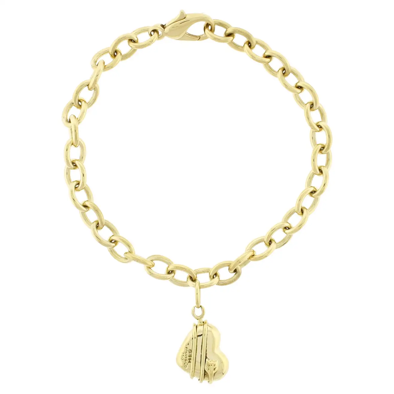 Tiffany & Co Heart with Cupid’s Arrow Gold Charm Bracelet | Pampillonia ...