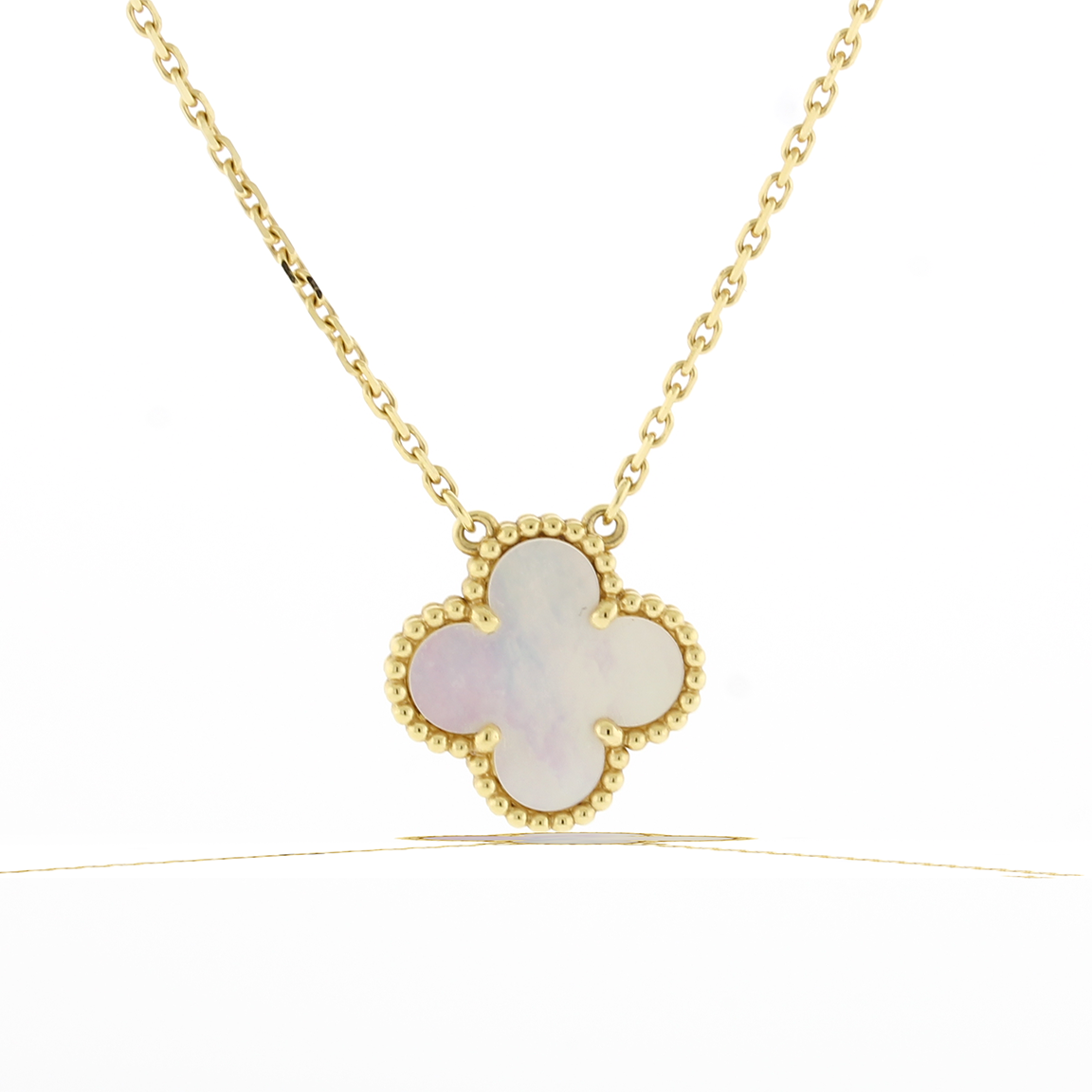 VAN CLEEF & ARPELS MOTHER OF PEARL AND GOLD 'VINTAGE ALHAMBRA